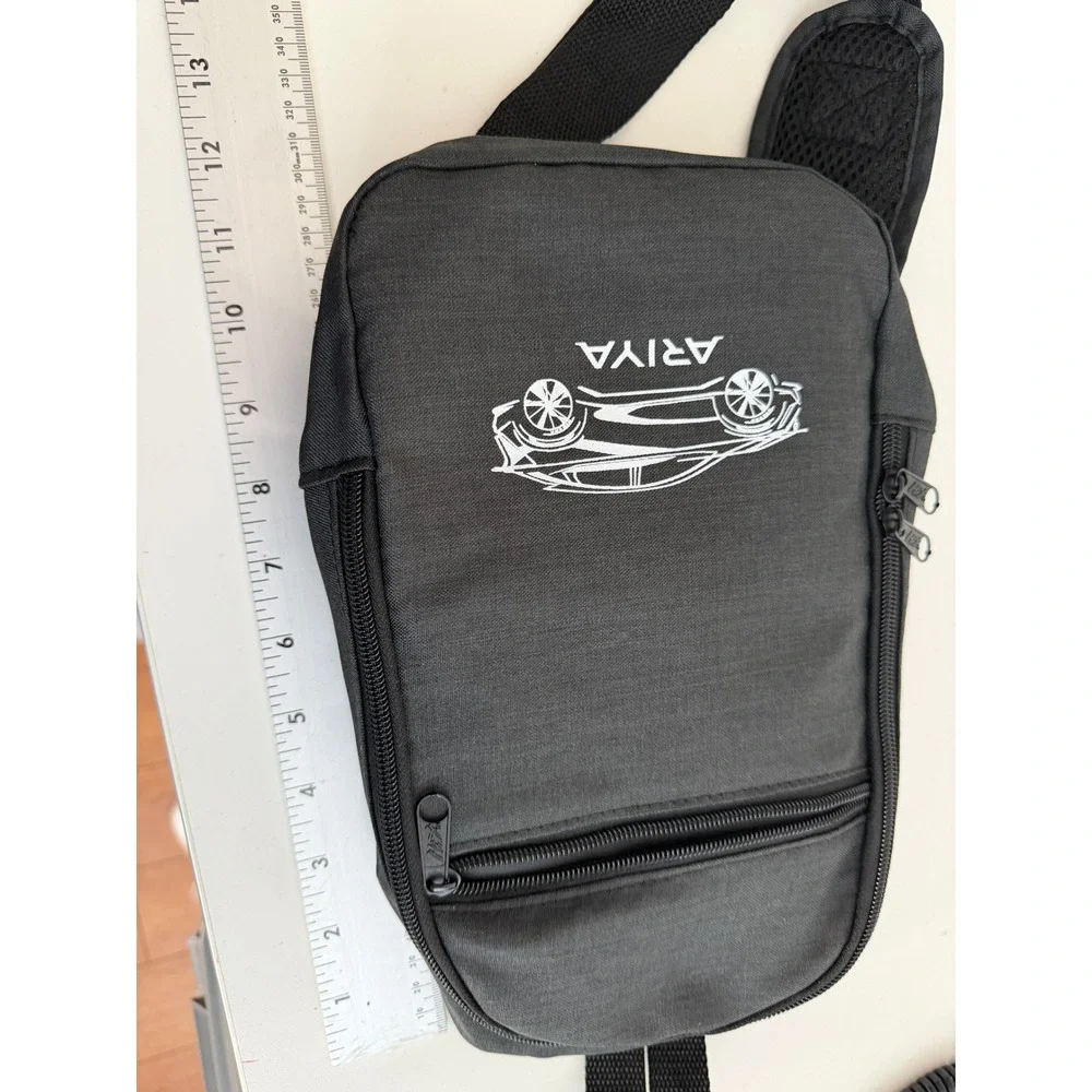 Nissan Ariya Black Sling Bag Backpack and Embroidered Golf Towel Set EV Promo